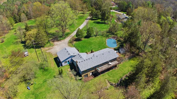 $409,900 | 9095 Huron River Drive, Brighton, MI 48116