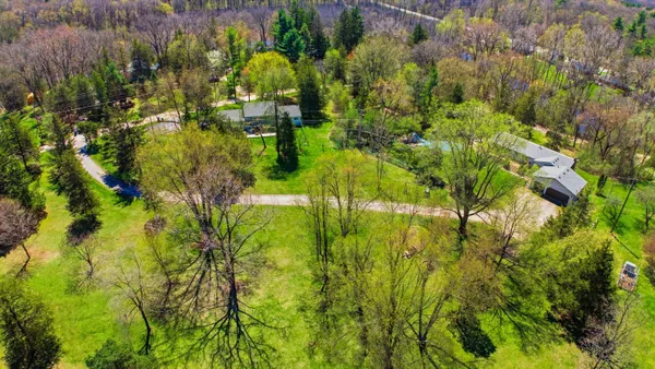 $409,900 | 9095 Huron River Drive, Brighton, MI 48116