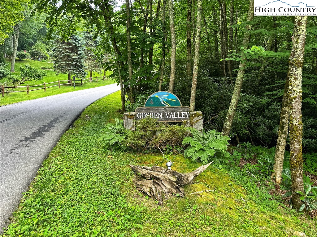 a view of a garden with an outdoor seating