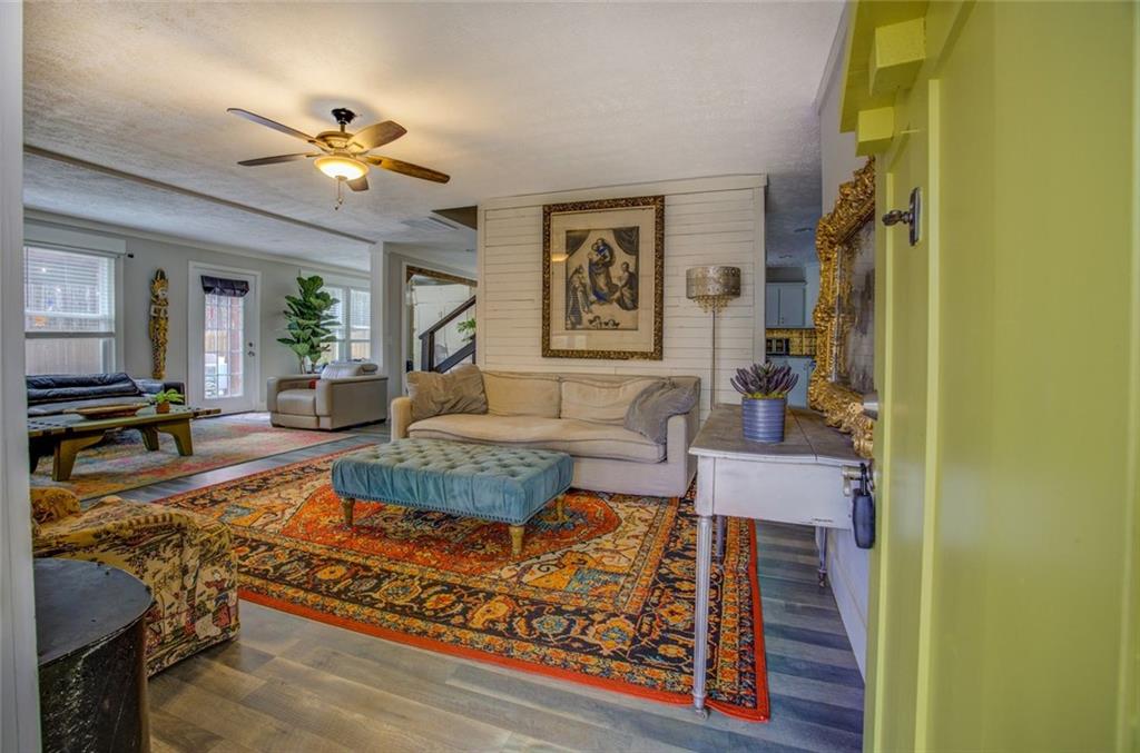 2100 Morgan Lane Covington, GA 30014 - Photo 14 of 47 a living room with furniture and a chandelier