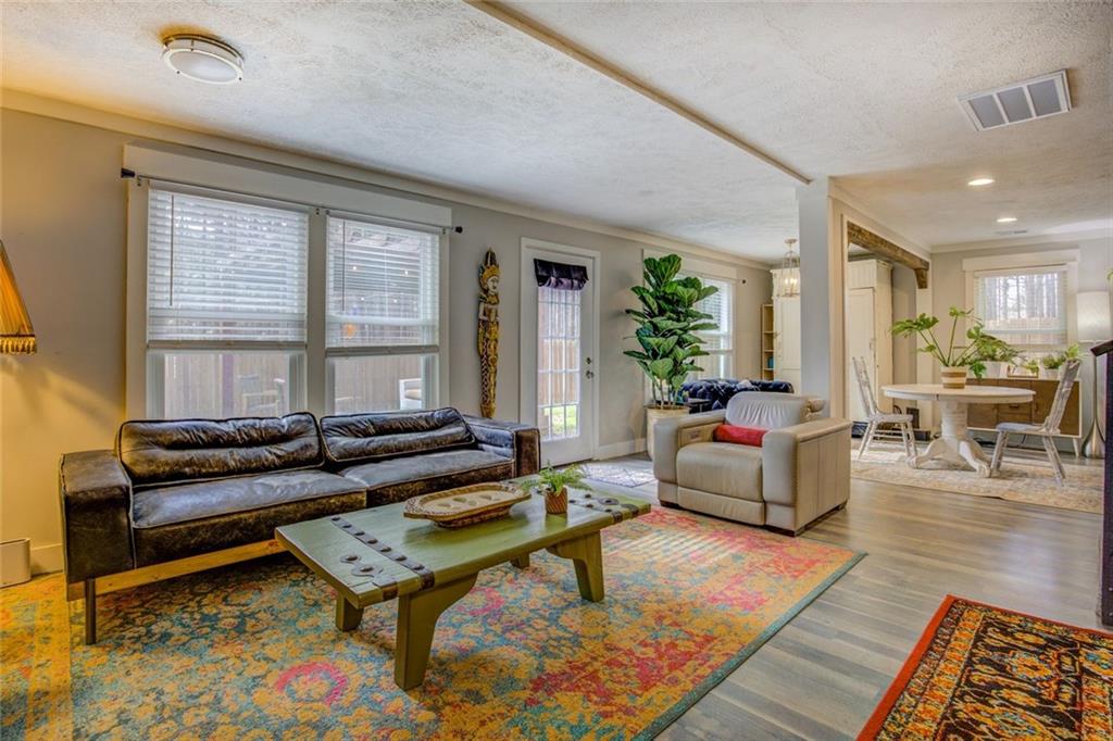 2100 Morgan Lane Covington, GA 30014 - Photo 20 of 47 a living room with furniture and a rug