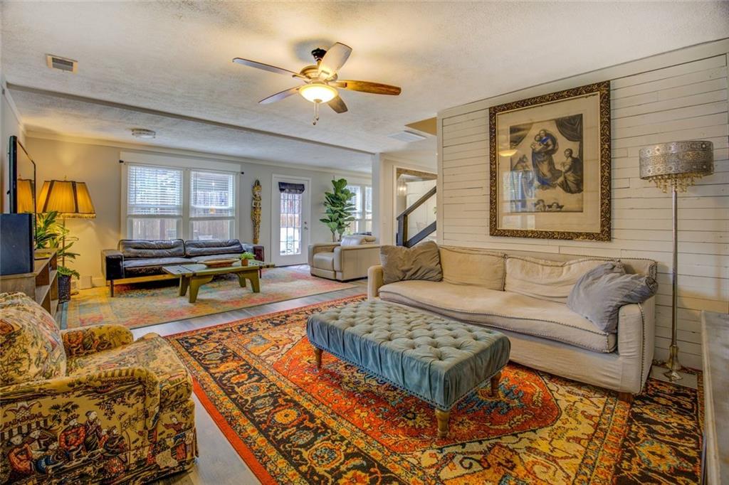 2100 Morgan Lane Covington, GA 30014 - Photo 21 of 47 a living room with furniture and a flat screen tv