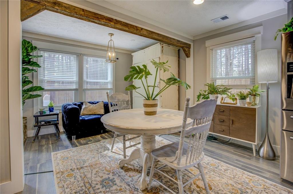 2100 Morgan Lane Covington, GA 30014 - Photo 22 of 47 a view of a dining room with furniture and wooden floor