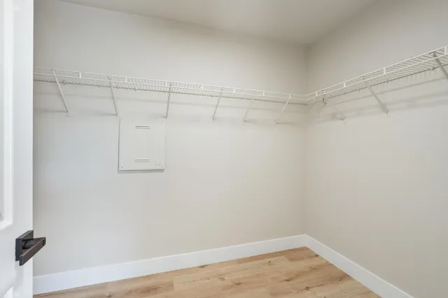 a view of a room with racks on the wall