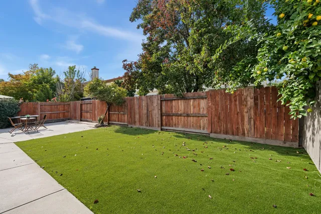 a view of garden with patio