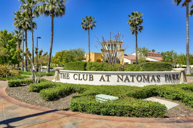 a sign on the side of the road