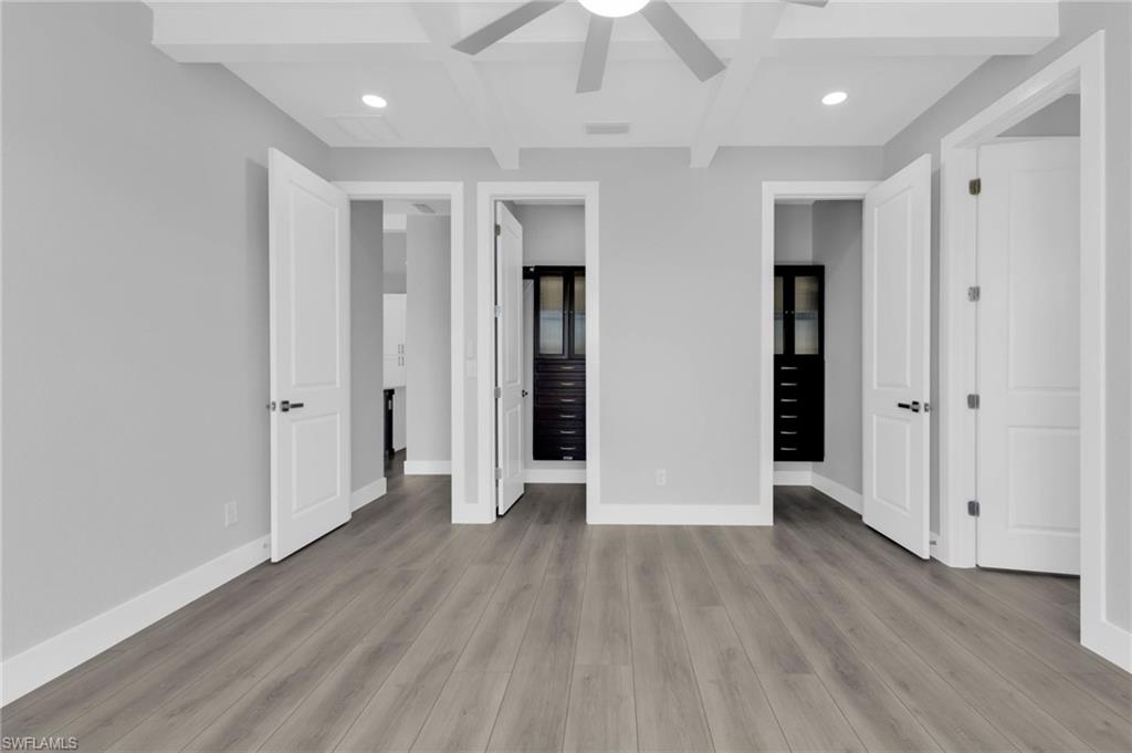 1323 Wesley Drive Punta Gorda, FL 33950 - Photo 32 of 50 wooden floor in an empty room with wooden floor