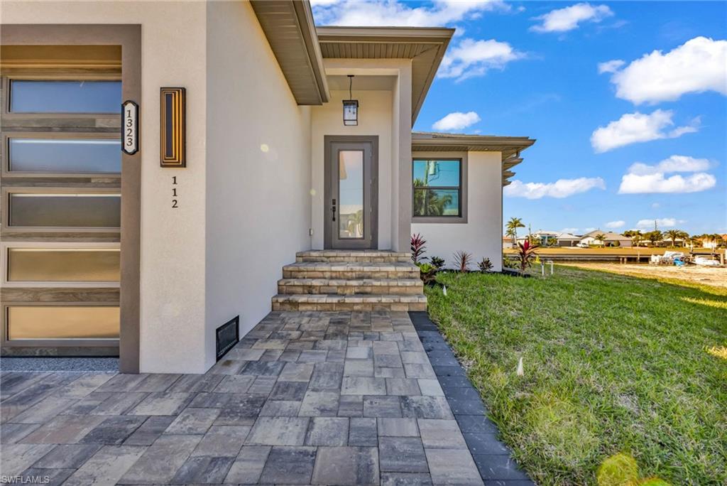 1323 Wesley Drive Punta Gorda, FL 33950 - Photo 4 of 50 a view of a house with a yard