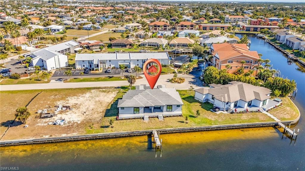 1323 Wesley Drive Punta Gorda, FL 33950 - Photo 49 of 50 an aerial view of residential houses with outdoor space and swimming pool