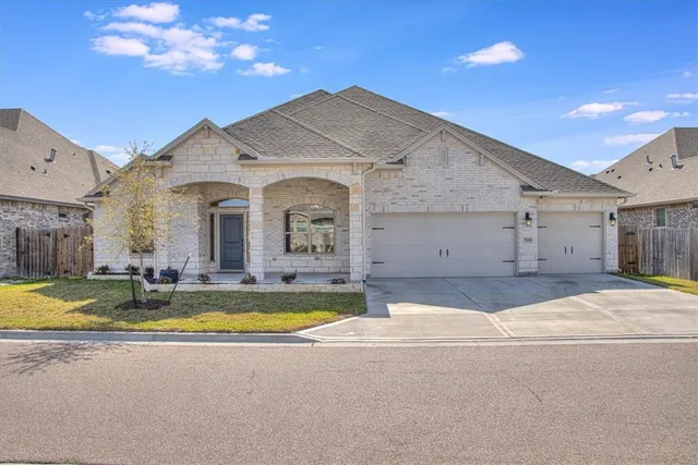 a view of swimming pool with outdoor seating and yard