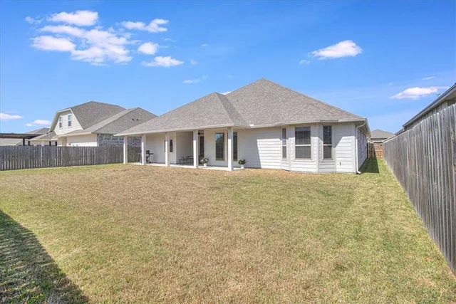 a house view with a garden space