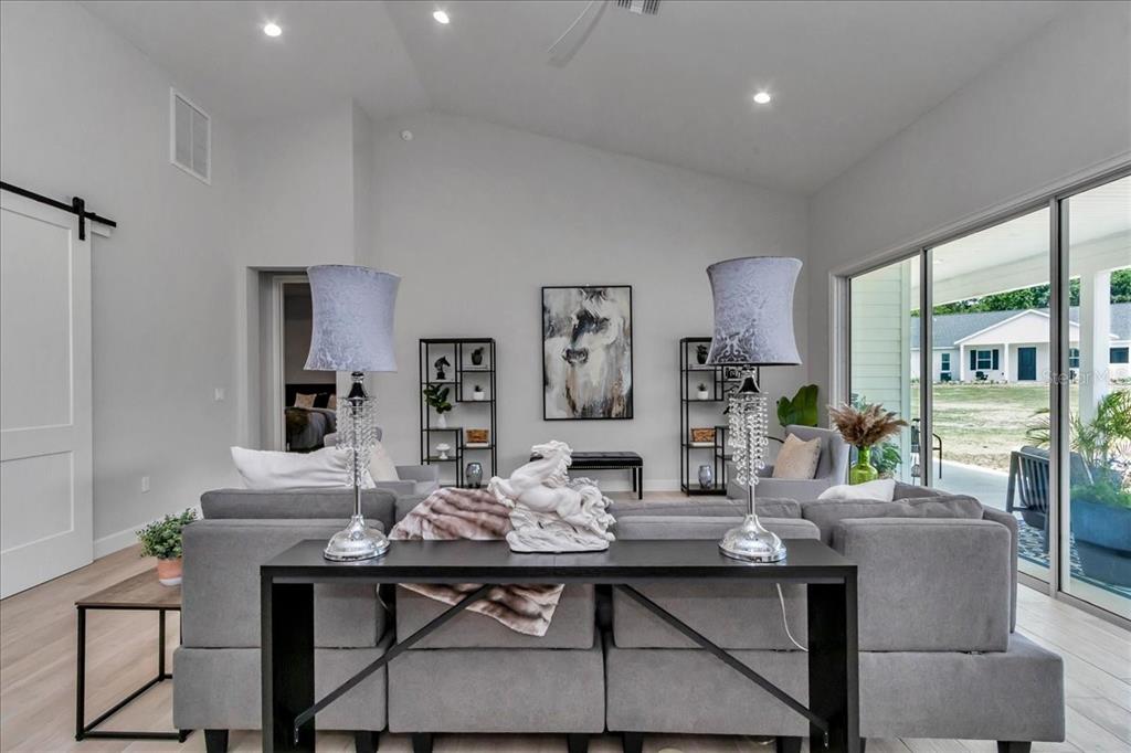 1631 West Highway 329 Citra, FL 32113 - Photo 20 of 82 a view of a dining room with furniture window and wooden floor