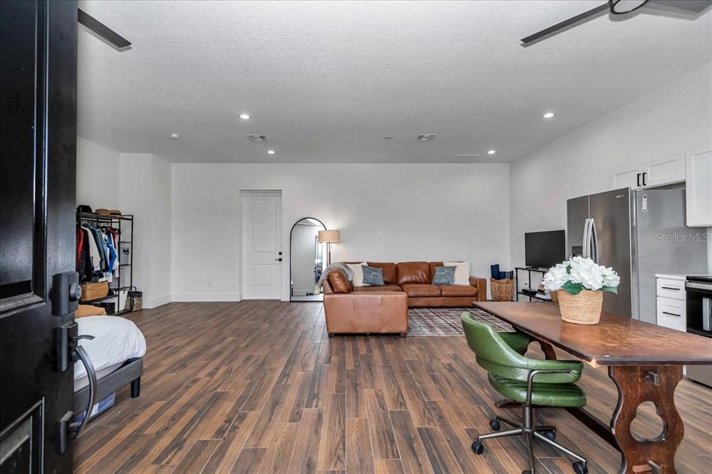 1631 West Highway 329 Citra, FL 32113 - Photo 56 of 82 a living room with furniture and wooden floor