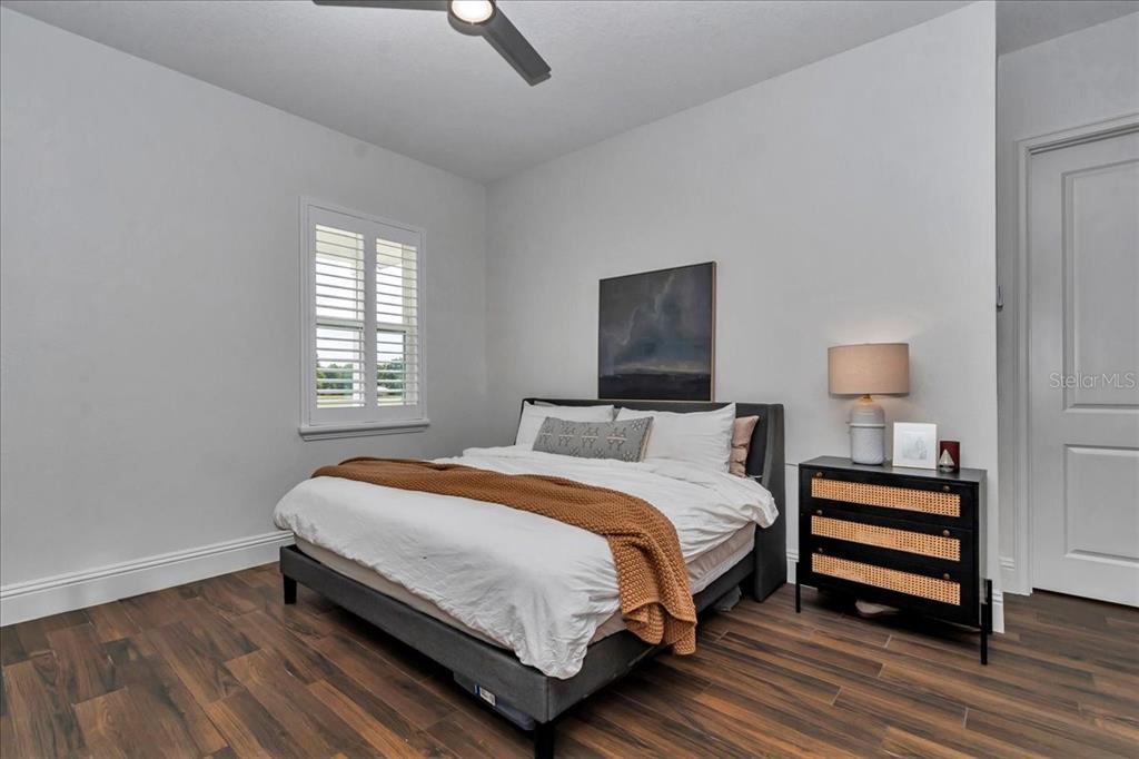 1631 West Highway 329 Citra, FL 32113 - Photo 60 of 82 a bedroom with a bed and a window