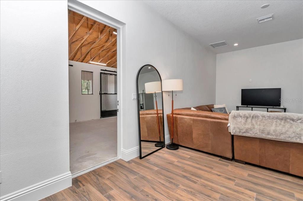 1631 West Highway 329 Citra, FL 32113 - Photo 61 of 82 a view of living room with furniture and flat screen tv