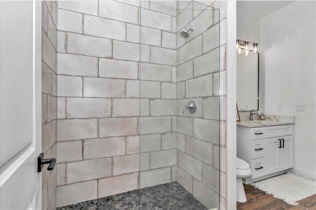 1631 West Highway 329 Citra, FL 32113 - Photo 63 of 82 a bathroom with a shower