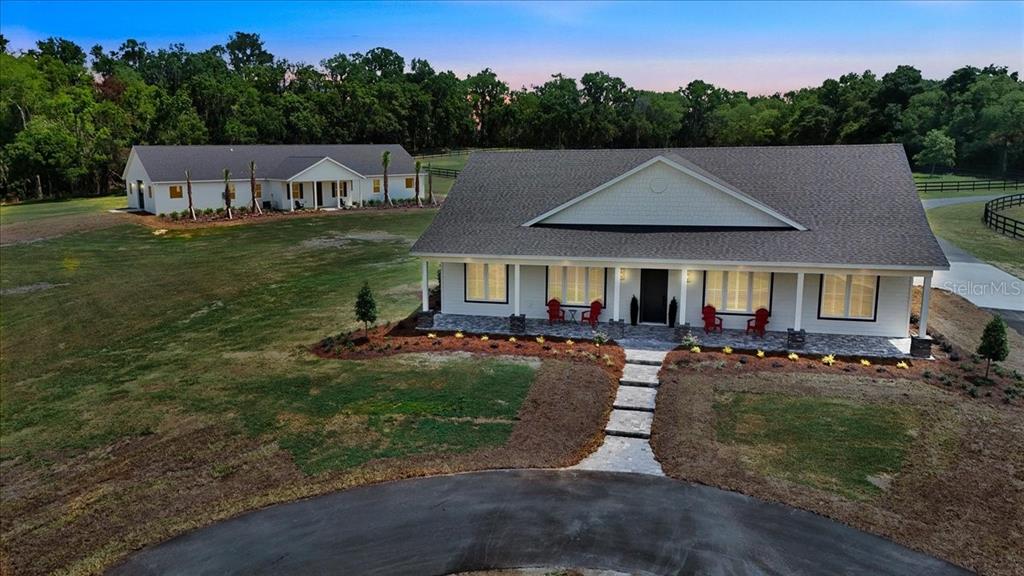 1631 West Highway 329 Citra, FL 32113 - Photo 7 of 82 a view of a house with backyard porch and sitting area
