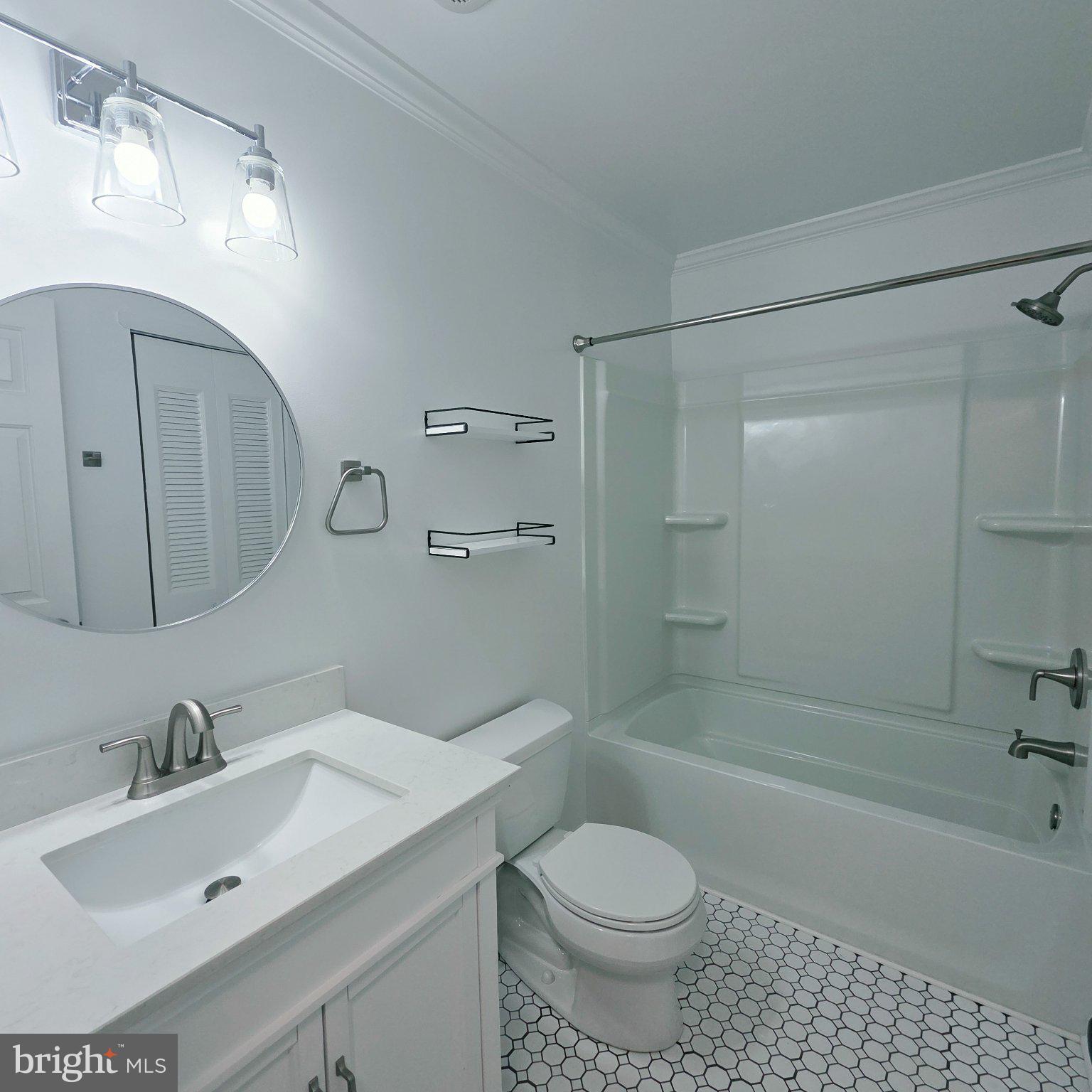 208 Ashley Run Voorhees, NJ 08043 - Photo 14 of 23 a bathroom with a sink toilet a mirror and shower