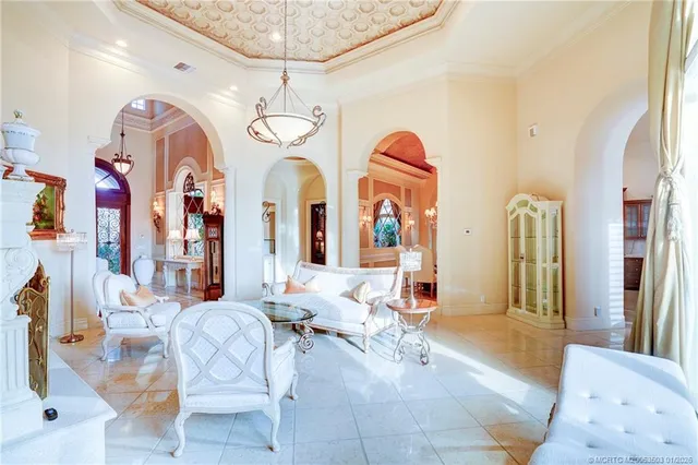a spacious bathroom with a tub double sink and a large mirror