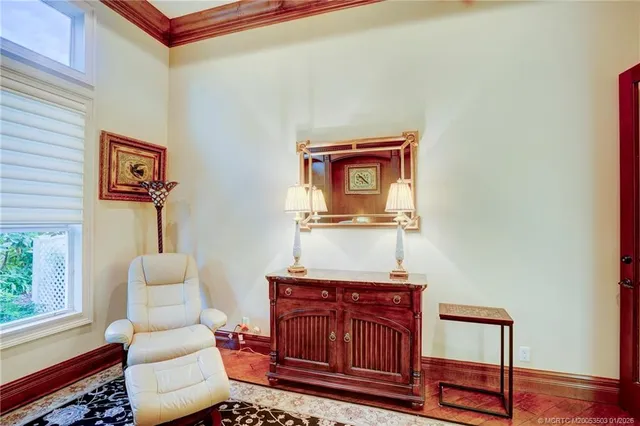 a large kitchen with a table and chairs in it