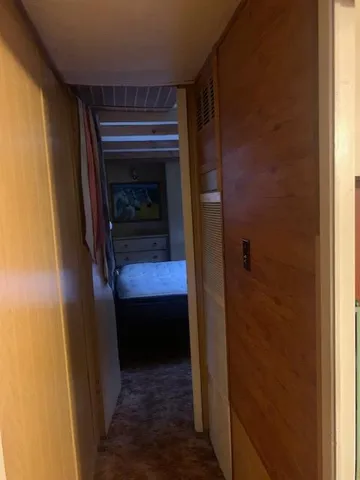 a room that has a door and a wooden door