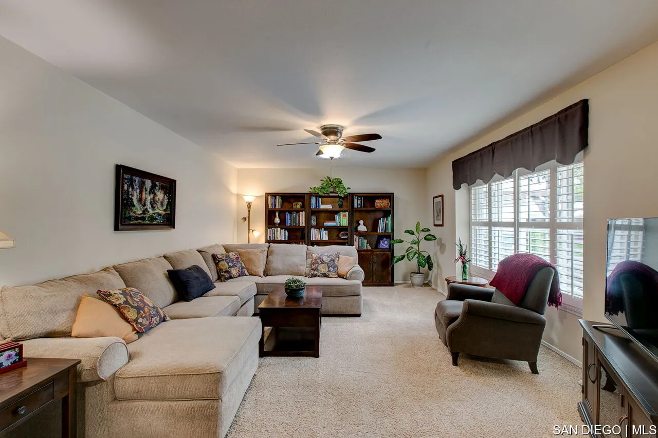 4700 Circle Lazy J Road Riverside, CA 92501 - Photo 11 of 24 a living room with furniture and a large window