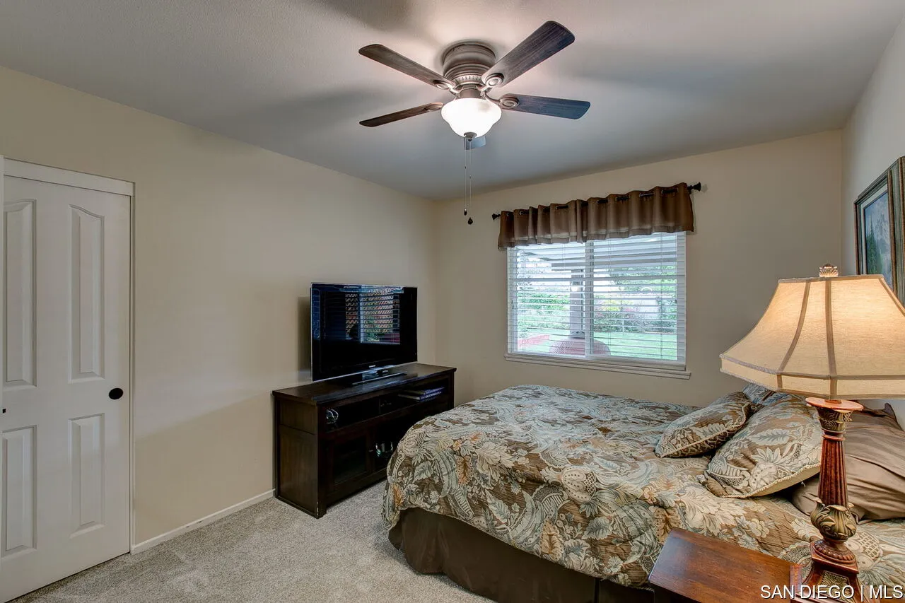 4700 Circle Lazy J Road Riverside, CA 92501 - Photo 14 of 24 a bedroom with a bed and a window