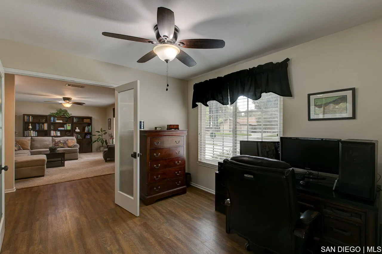 4700 Circle Lazy J Road Riverside, CA 92501 - Photo 17 of 24 a view of a livingroom with furniture and a window