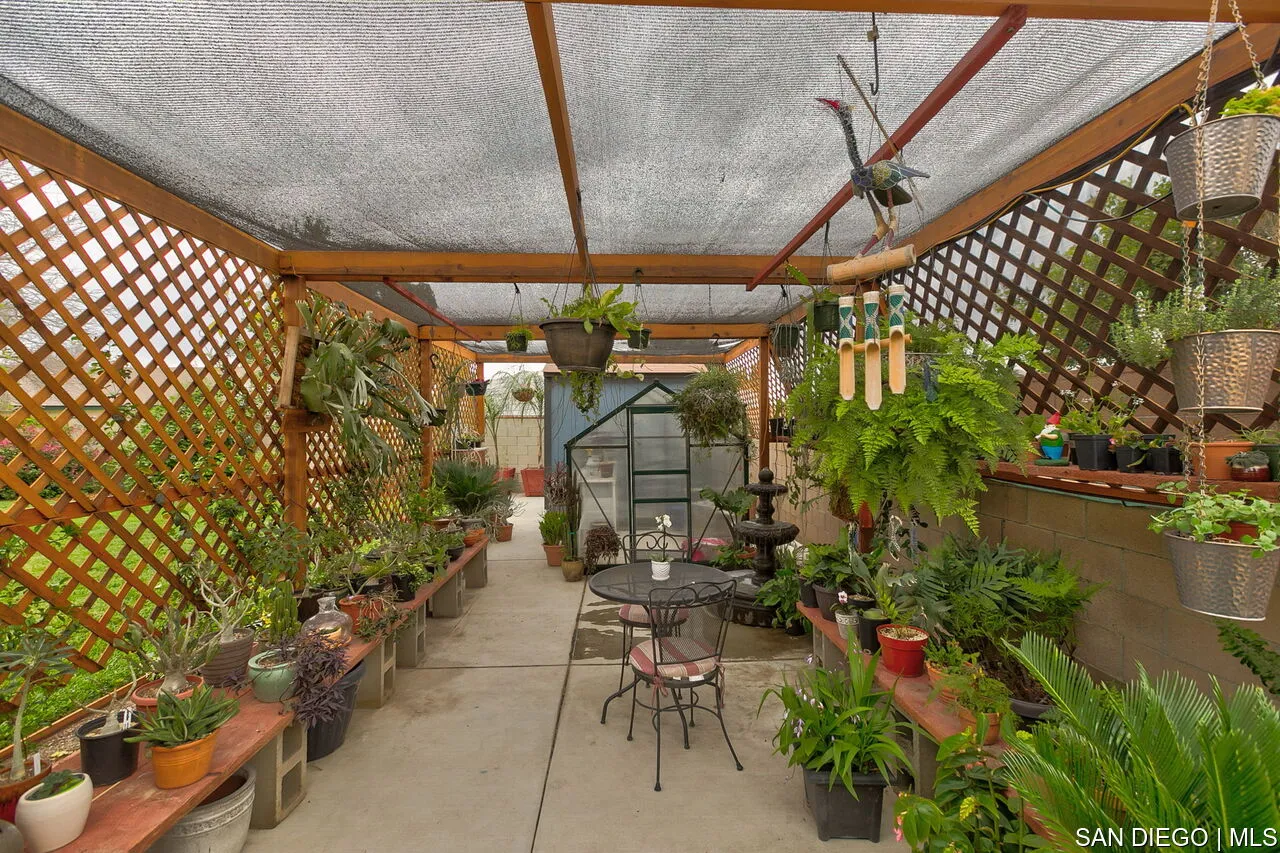 4700 Circle Lazy J Road Riverside, CA 92501 - Photo 19 of 24 a view of patio with table and chairs and potted plants