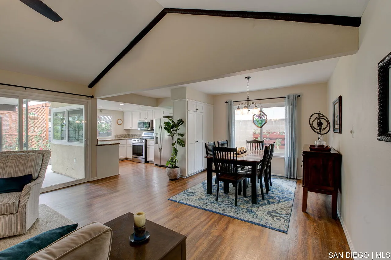4700 Circle Lazy J Road Riverside, CA 92501 - Photo 8 of 24 a dining room with furniture wooden floor and a rug