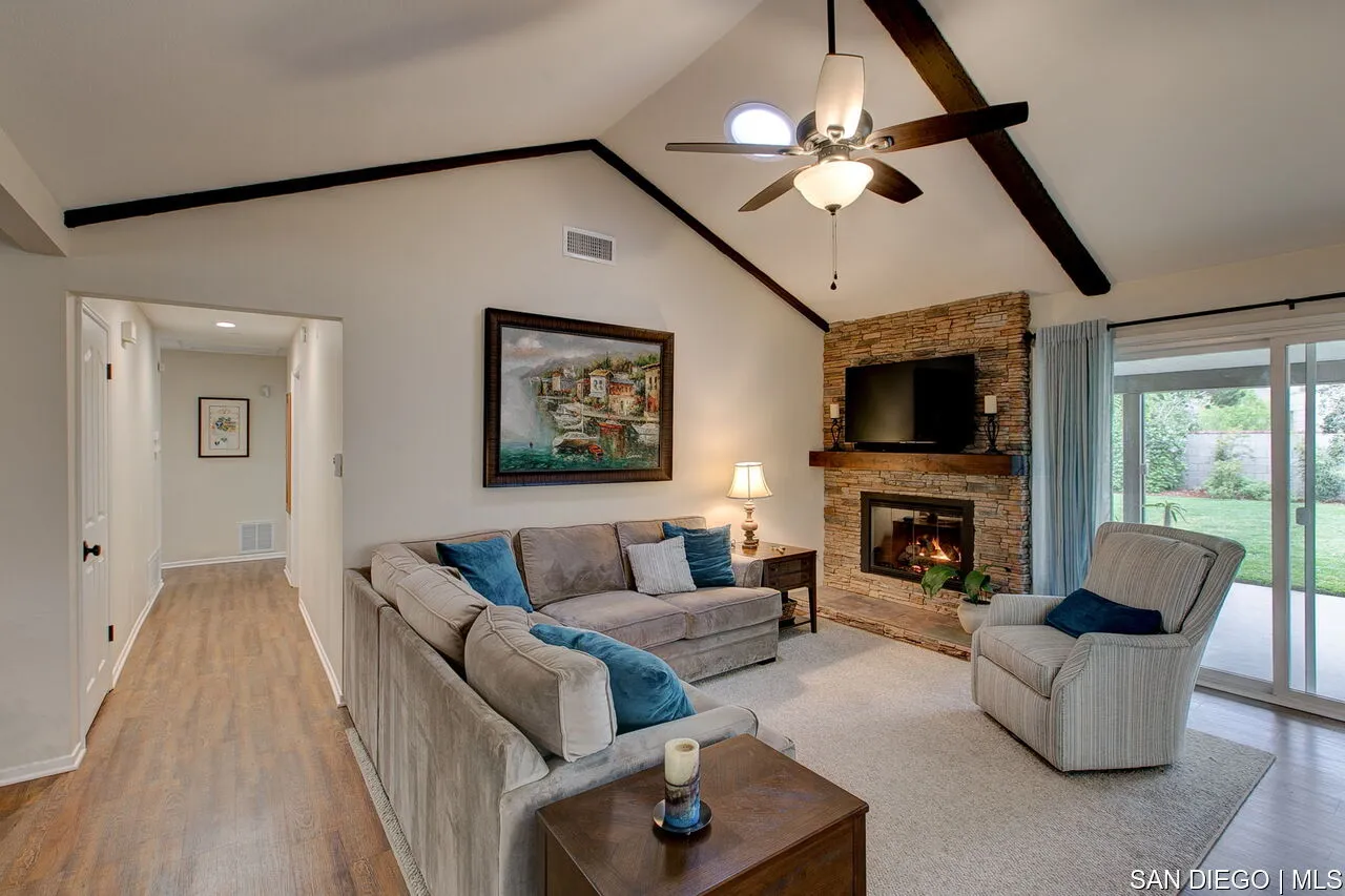 4700 Circle Lazy J Road Riverside, CA 92501 - Photo 9 of 24 a living room with furniture and a fireplace