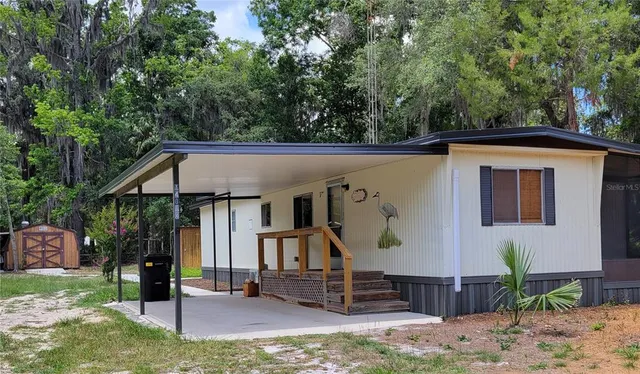 swimming pool view with a outdoor seating
