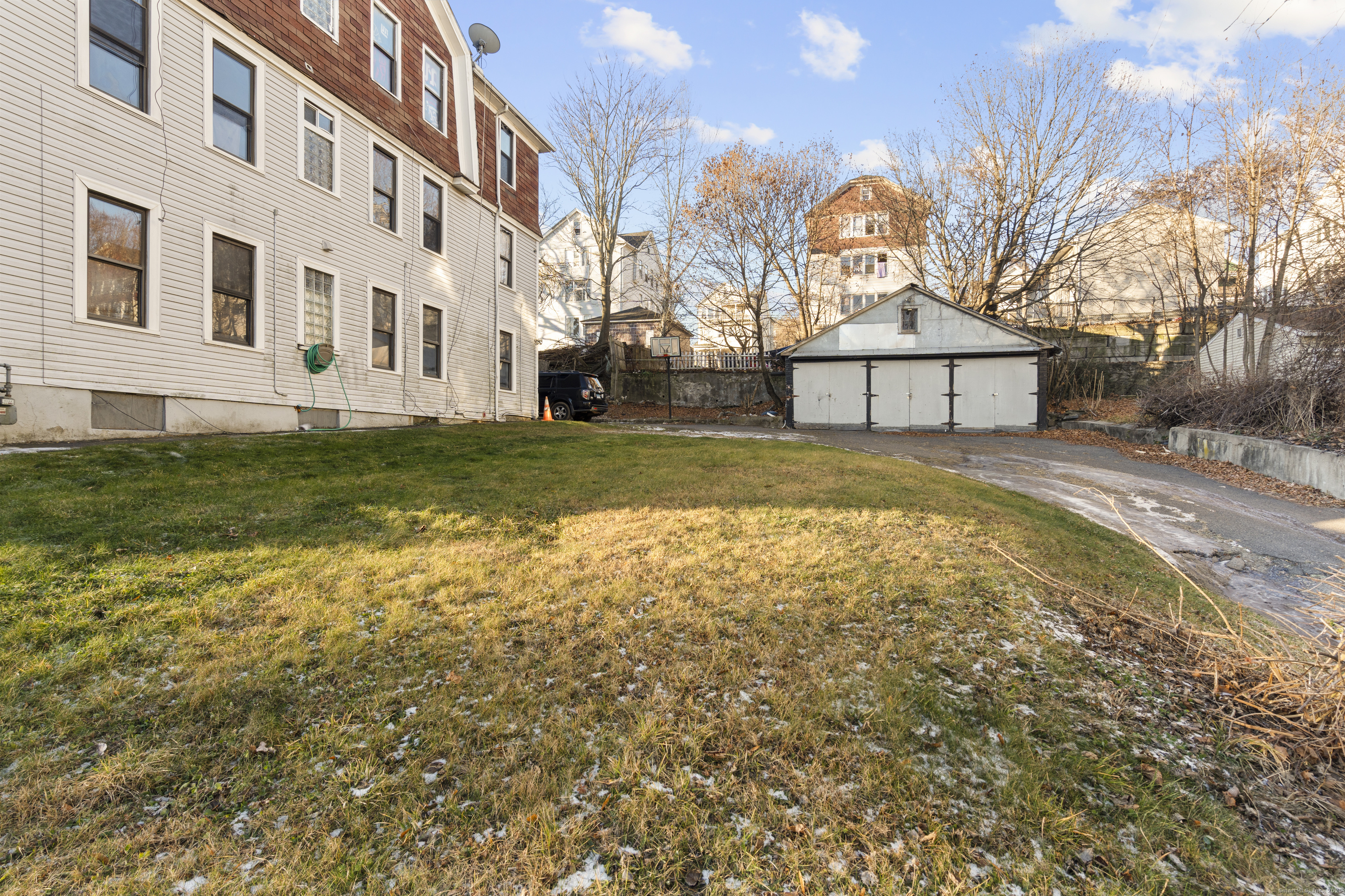 141 Draher Street Waterbury, CT 06708 - Photo 19 of 20 a view of back yard of the house