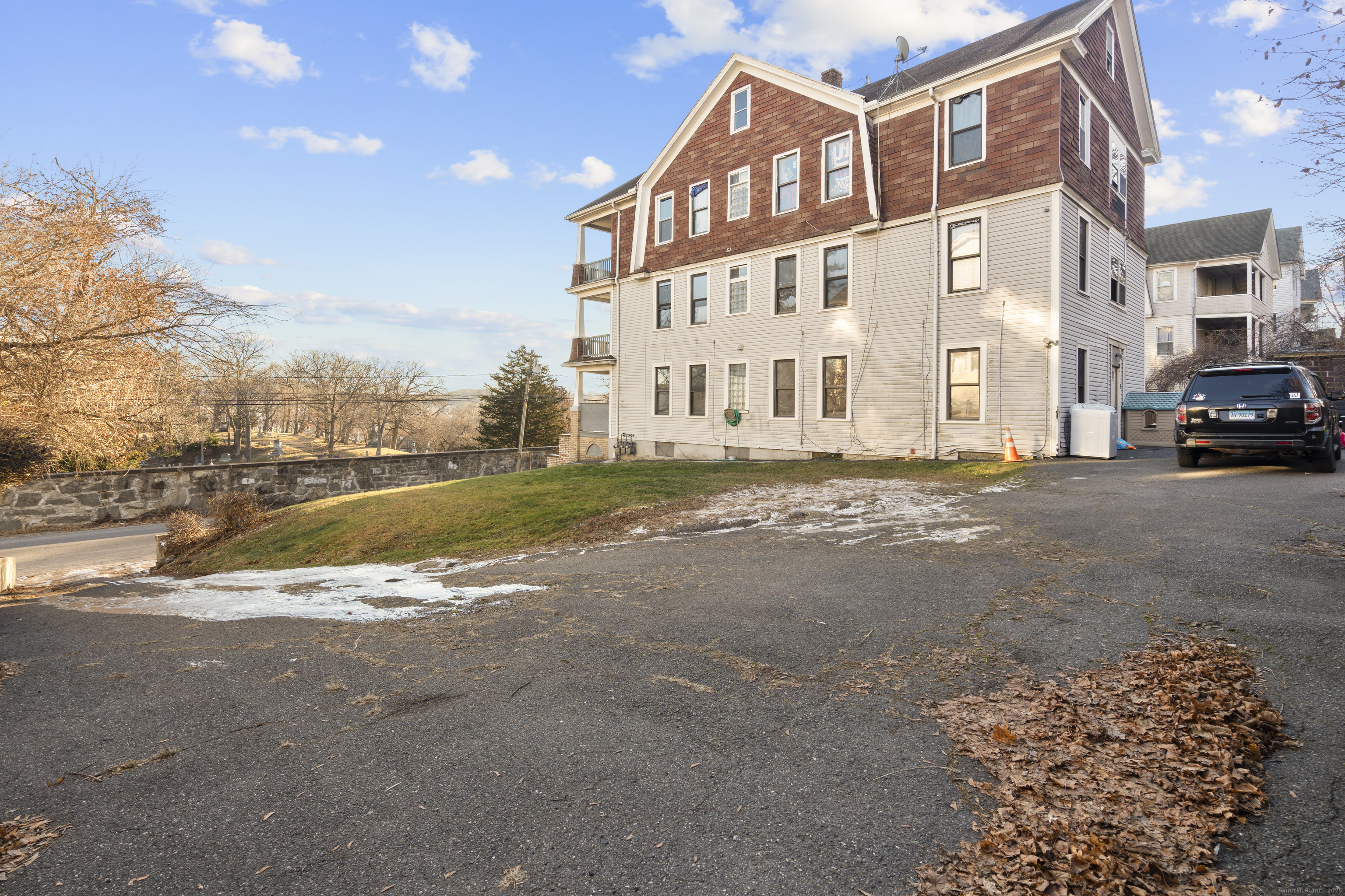 141 Draher Street Waterbury, CT 06708 - Photo 20 of 20 a view of a street with a building in the background