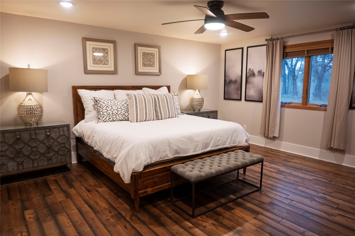 5100 Farm To Market Road 690 Burnet, TX 78611 - Photo 5 of 10 Bedroom with dark wood-style floors and a ceiling fan