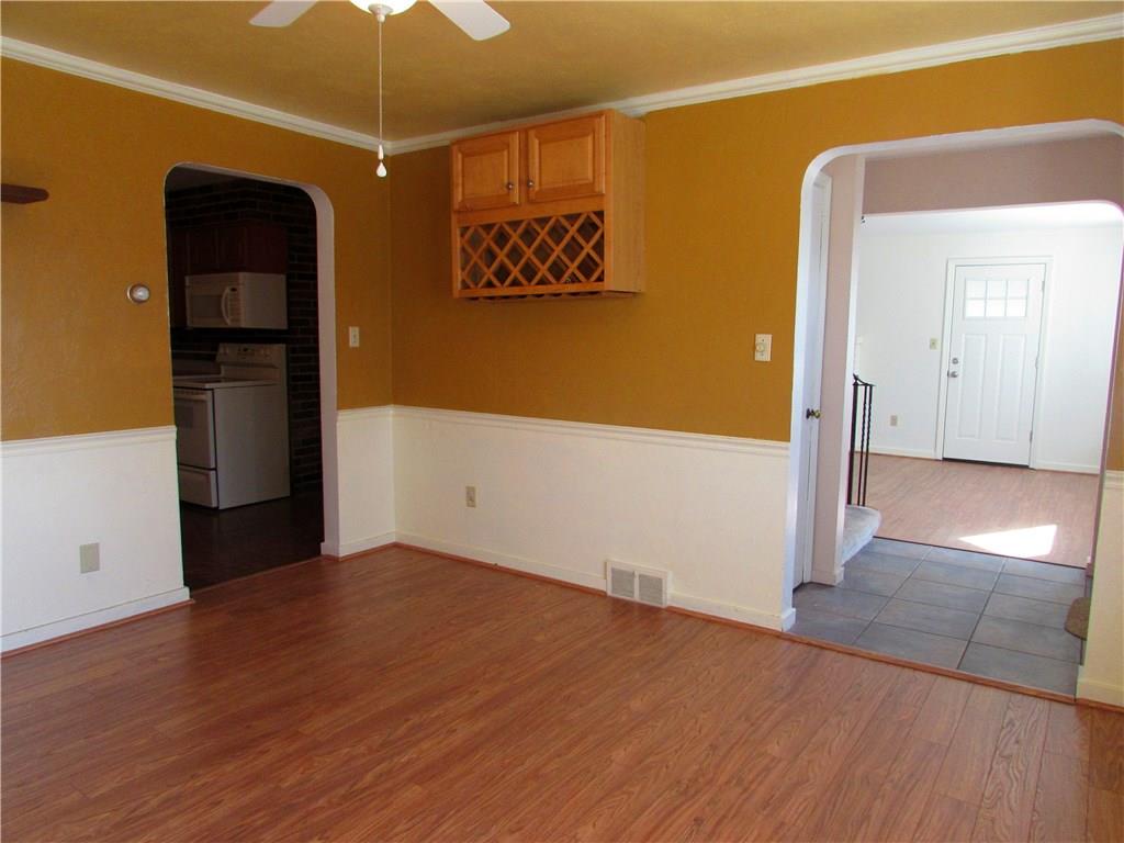 914 Wible Run Road Pittsburgh, PA 15209 - Photo 8 of 25 dining room with wine rack
