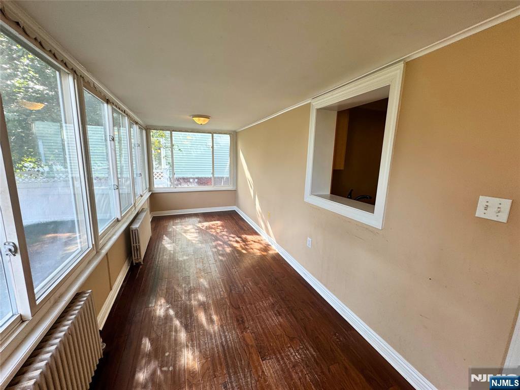 11-02 Charles Street Fair Lawn, NJ 07410 - Photo 7 of 15 a view of hallway with windows