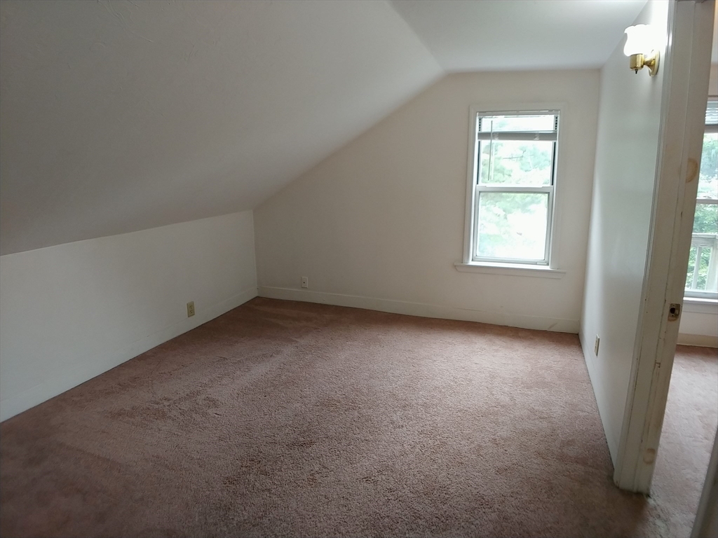 77 Hudson Street, Unit 2 Marlborough, MA 01752 - Photo 21 of 30 an empty room with a window