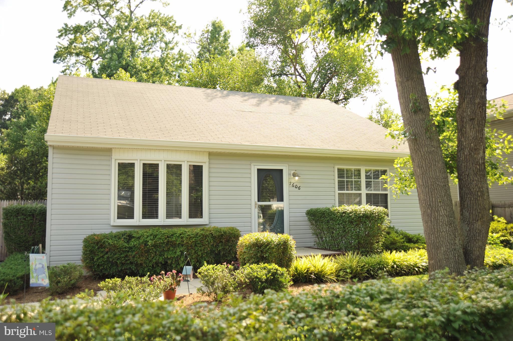 1606 Oriole Road Edgewater, MD 21037 - Photo 22 of 29 a house with trees in the background