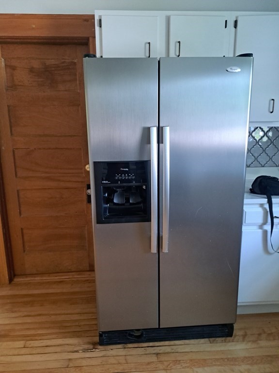 24 Clearview Avenue, Unit 2 Worcester, MA 01605 - Photo 2 of 32 a kitchen with metallic refrigerator freezer and a dishwasher