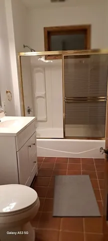 a bathroom with a sink and a toilet