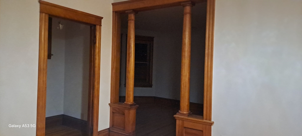 24 Clearview Avenue, Unit 2 Worcester, MA 01605 - Photo 27 of 32 a view of a hallway with wooden floor and closet