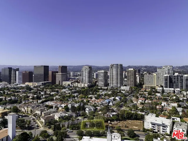 a view of a city with tall buildings
