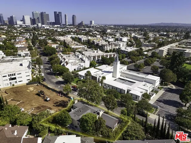 an aerial view of a city with lots of residential buildings