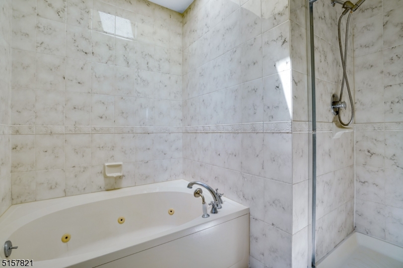 22 Court Road Morris Plains, NJ 07950 - Photo 24 of 28 a bathroom with a bathtub