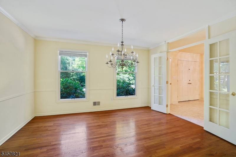 22 Court Road Morris Plains, NJ 07950 - Photo 7 of 28 a view of a room with window wooden floor and front door