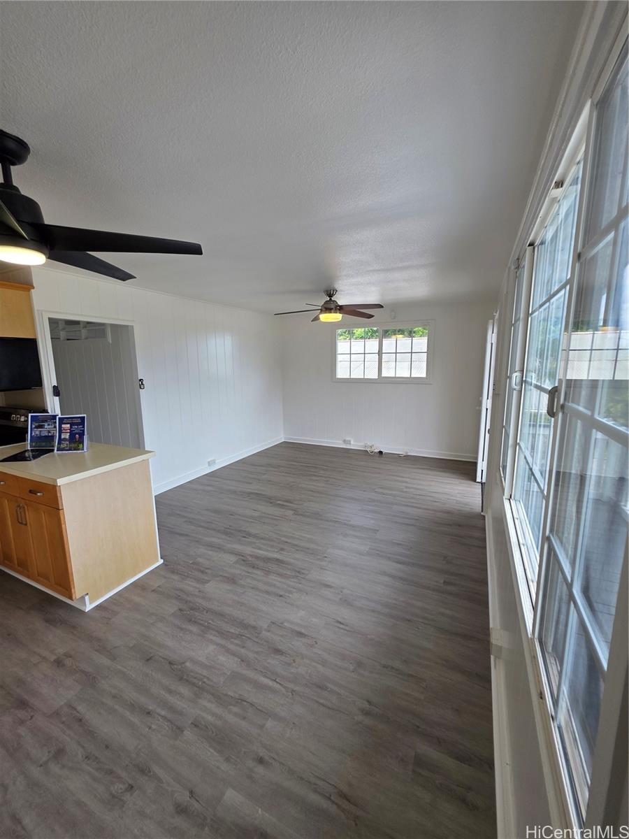 45-557 Keaahala Road, Unit K Kaneohe, HI 96744 - Photo 19 of 20 a view of livingroom with furniture and wooden floor