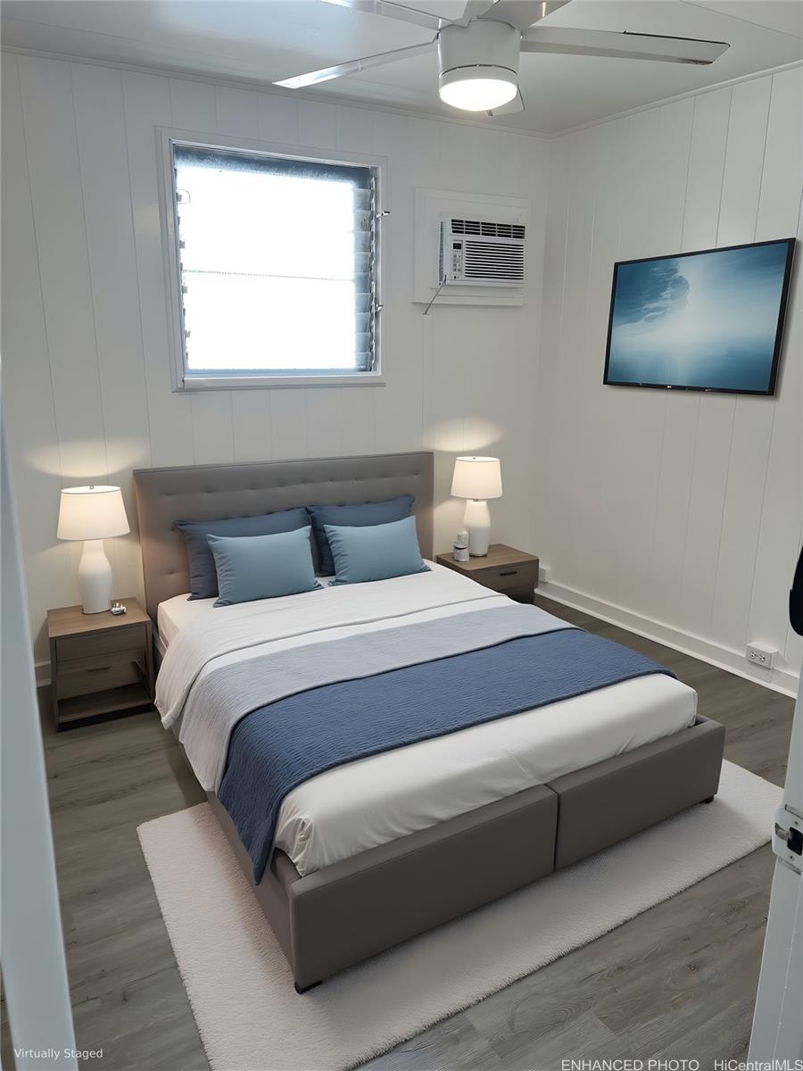 45-557 Keaahala Road, Unit K Kaneohe, HI 96744 - Photo 6 of 20 a bedroom with a bed and a night stand