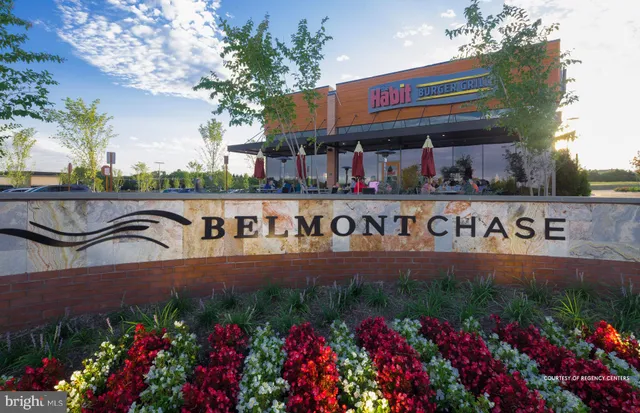 a front view of building and outdoor space