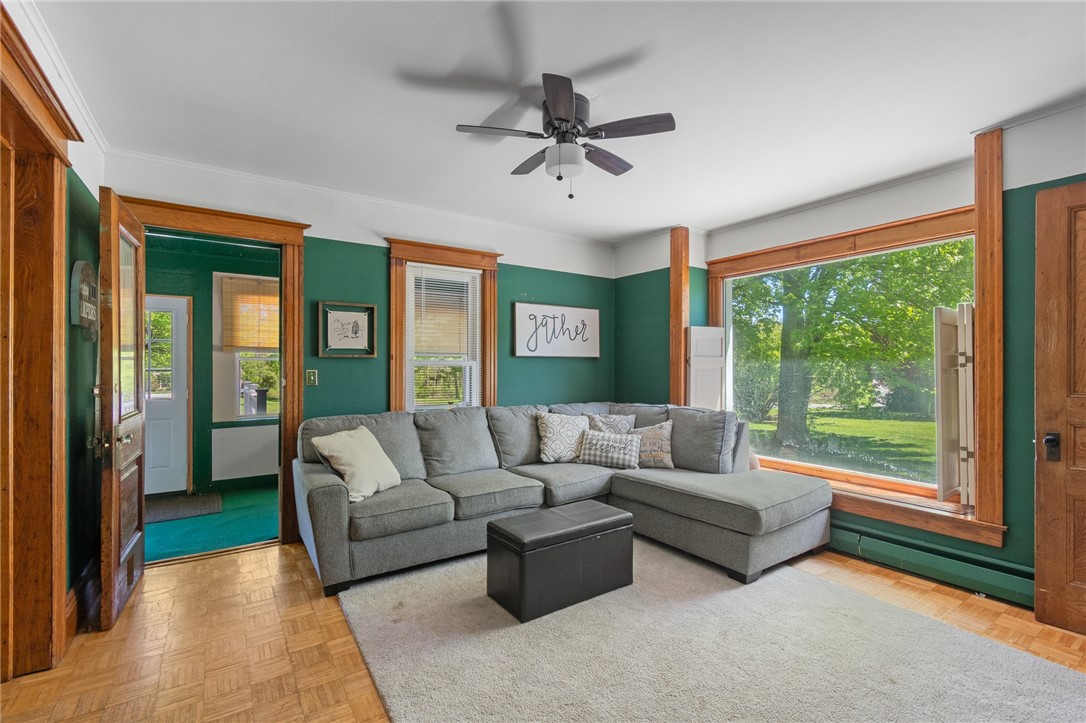 5443 Russell Road Marion, NY 14505 - Photo 19 of 48 The living room- there are three in this home!